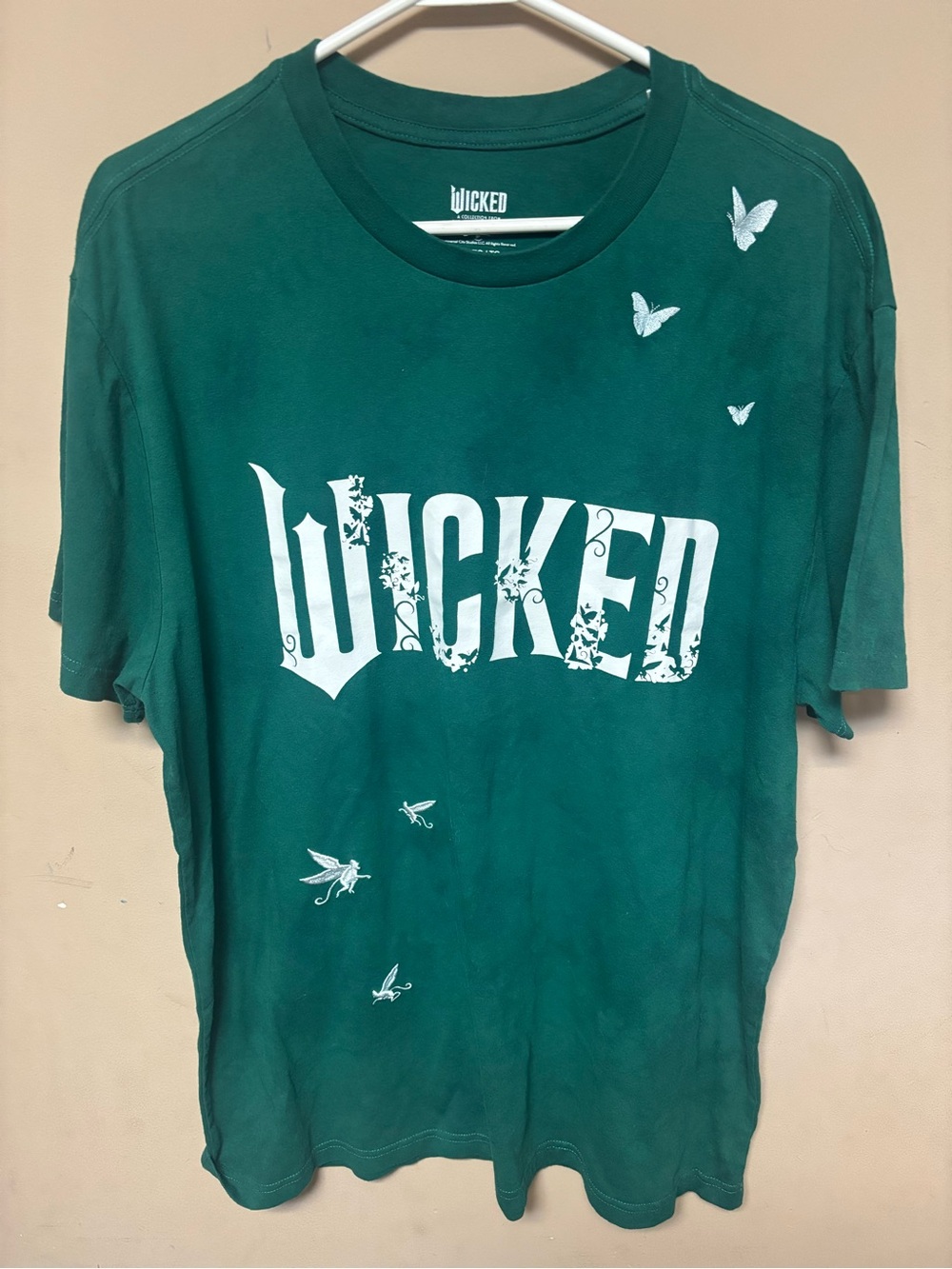 Universal Studios Wicked Graphic Tee in Deep Green Embroidered